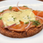 image of republique's potato pancake topped with lox, eggs, and hollandaise