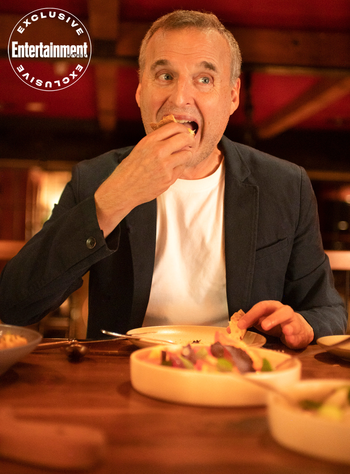 Image of Phil Rosenthal trying some appetizers at Republique restaurant in Los Angeles